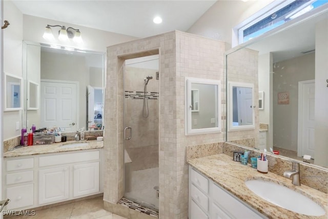 1302 SW 20th St, Cape Coral, FL 33991 - bathroom featuring a stall shower, two vanities, and tile patterned floors