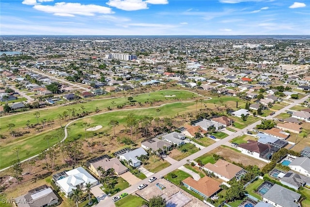 1302 SW 20th St, Cape Coral, FL 33991 - aerial overview of property's location with a local golf course and nearby suburban area
