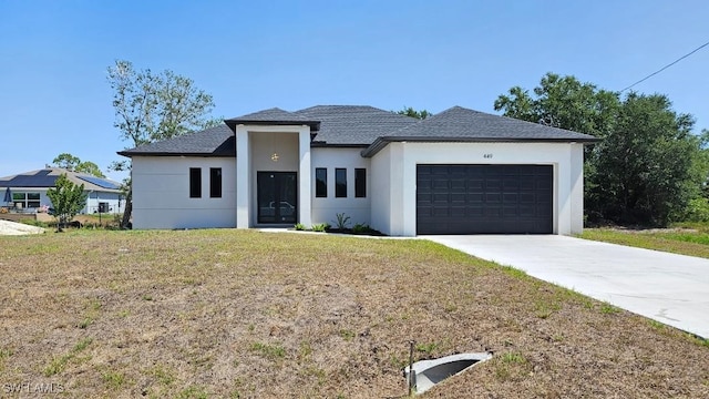 449 Redwing St, Lehigh Acres, FL 33974 - view of front of property featuring an attached garage, stucco siding, concrete driveway, and a front yard
