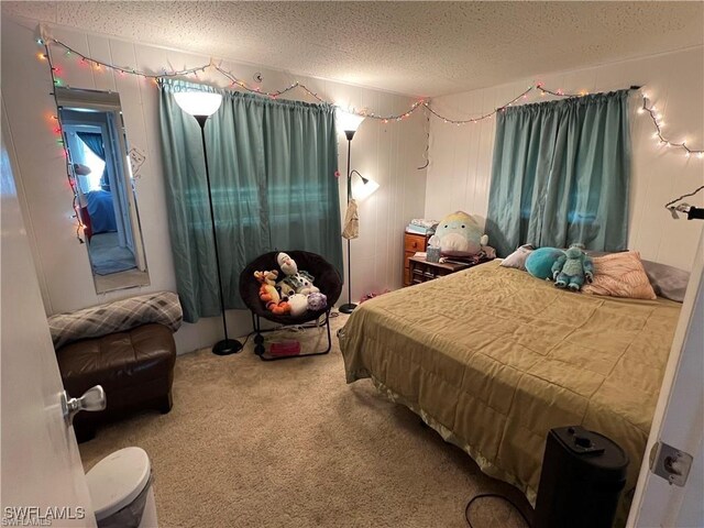 22147 Catherine Ave, Port Charlotte, FL 33952 - bedroom with a textured ceiling and carpet