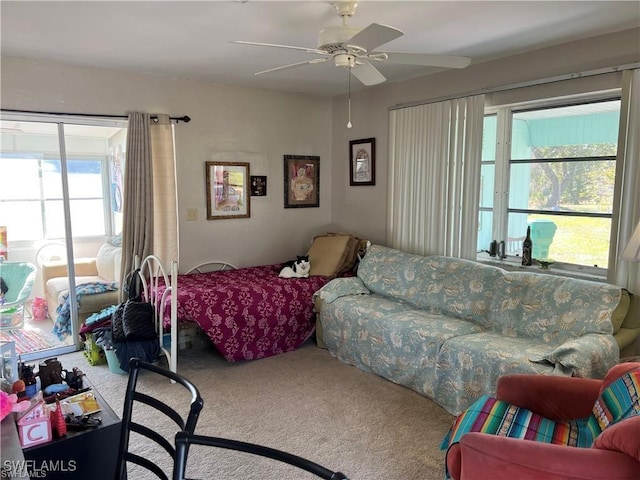 22147 Catherine Ave, Port Charlotte, FL 33952 - carpeted living room featuring a ceiling fan