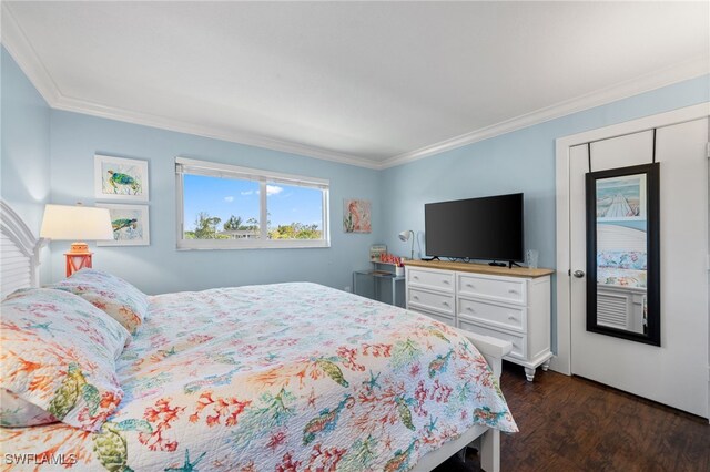 190 Turtle Lake Ct Unit 311, Naples, FL 34105 - bedroom with ornamental molding and dark wood-style floors