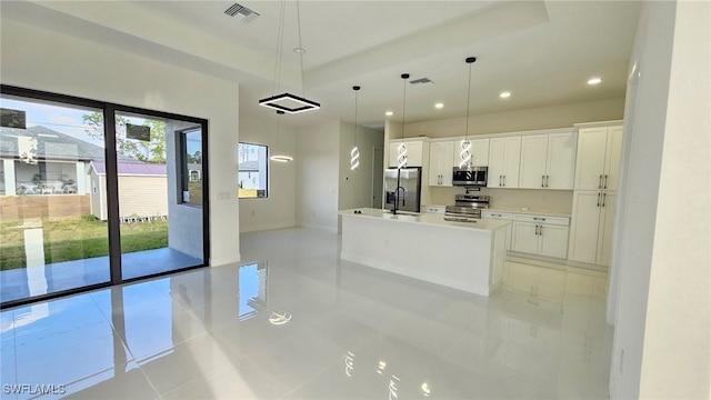 1214 Hibiscus Ave, Lehigh Acres, FL 33972 - kitchen with appliances with stainless steel finishes, light tile patterned floors, white cabinetry, recessed lighting, and baseboards