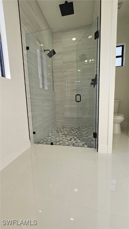 1214 Hibiscus Ave, Lehigh Acres, FL 33972 - full bath featuring tile patterned floors, a shower stall, toilet, and baseboards