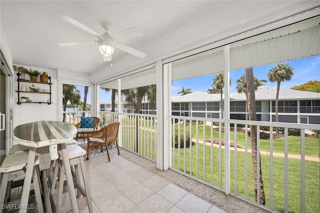 676 W Elkcam Cir Unit 1222, Marco Island, FL 34145 - sunroom featuring ceiling fan and plenty of natural light