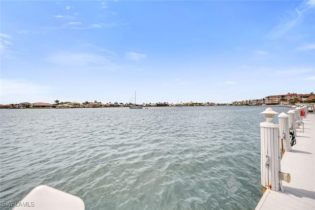 676 W Elkcam Cir Unit 1222, Marco Island, FL 34145 - dock featuring a water view