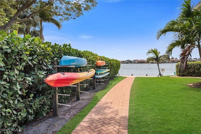 676 W Elkcam Cir Unit 1222, Marco Island, FL 34145 - view of grassy yard with a water view and boat lift