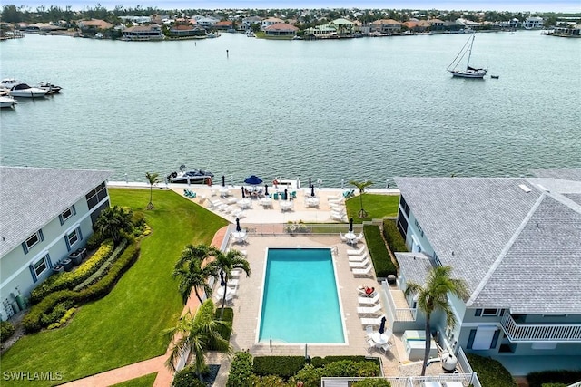 676 W Elkcam Cir Unit 1222, Marco Island, FL 34145 - drone / aerial view of a pool and a large body of water