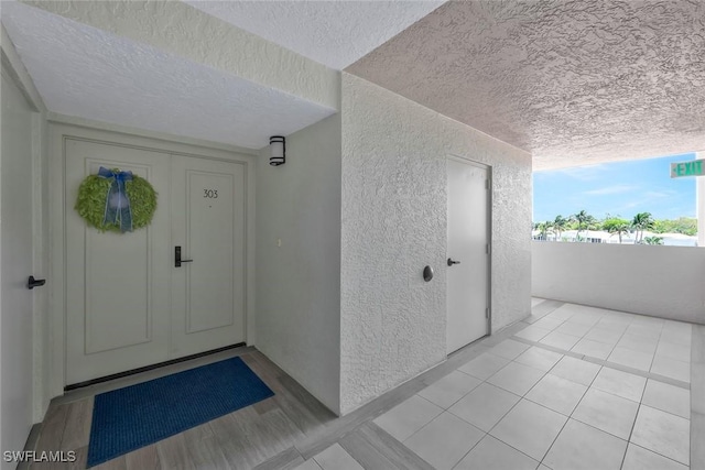 6573 Marissa Loop Unit 303, Naples, FL 34108 - property entrance featuring a balcony