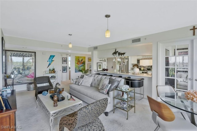 6573 Marissa Loop Unit 303, Naples, FL 34108 - view of carpeted living room