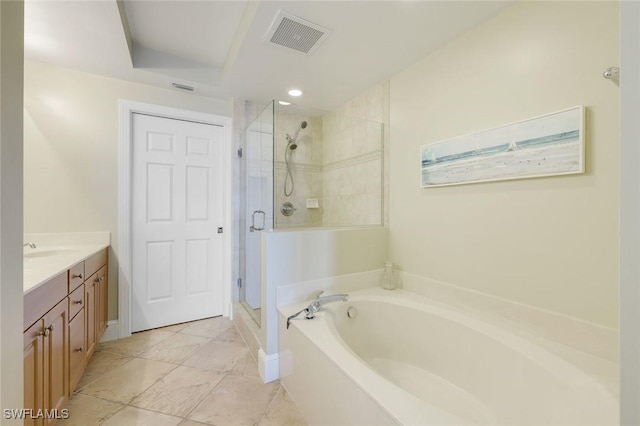 2745 1st St Unit 701, Fort Myers, FL 33916 - full bath featuring a garden tub, vanity, a stall shower, and tile patterned floors