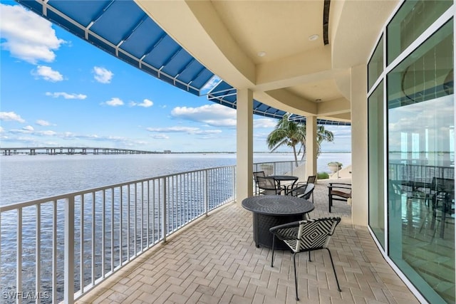 2745 1st St Unit 701, Fort Myers, FL 33916 - balcony featuring a water view and a sunroom