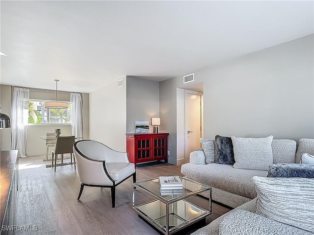 2544 1st St Unit 102, Fort Myers, FL 33901 - living room with wood finished floors