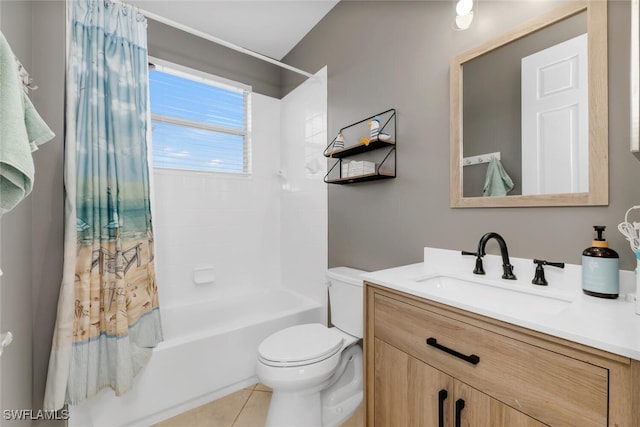 6619 Marbella Dr, Naples, FL 34105 - bathroom featuring shower / bath combo with shower curtain, vanity, toilet, and tile patterned floors