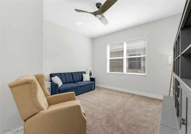 6619 Marbella Dr, Naples, FL 34105 - living area featuring a ceiling fan, light carpet, and baseboards