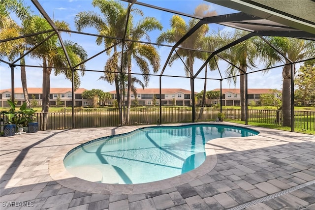 6619 Marbella Dr, Naples, FL 34105 - view of pool with a patio, a residential view, fence, and glass enclosure