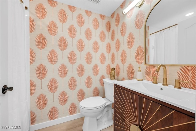 9087 Michael Cir Unit 9, Naples, FL 34113 - full bath with vanity, toilet, curtained shower, and wood finished floors