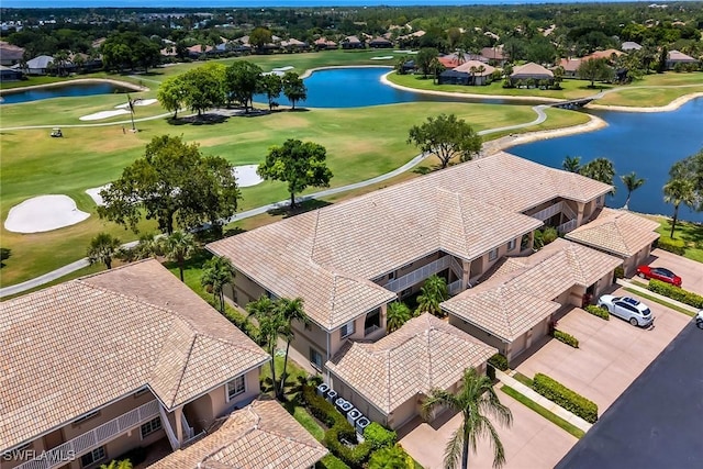 9087 Michael Cir Unit 9, Naples, FL 34113 - aerial perspective of suburban area featuring a large body of water and a local golf course
