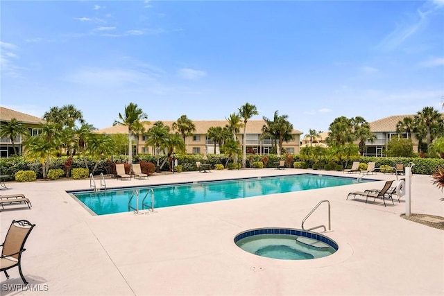 9087 Michael Cir Unit 9, Naples, FL 34113 - community pool featuring a community hot tub and a patio