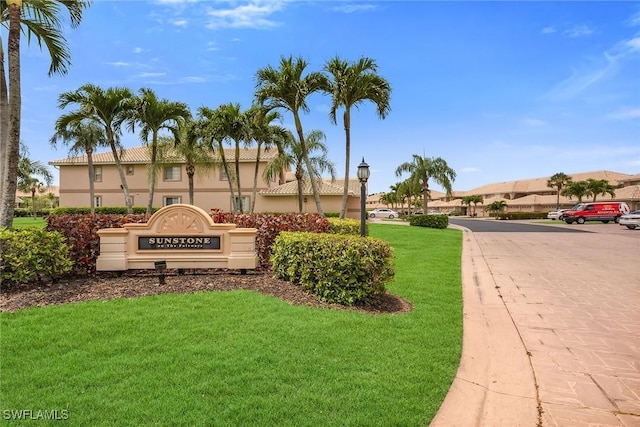 9087 Michael Cir Unit 9, Naples, FL 34113 - community sign featuring a yard