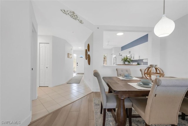 9087 Michael Cir Unit 9, Naples, FL 34113 - dining room with light wood-type flooring and recessed lighting