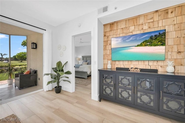 9087 Michael Cir Unit 9, Naples, FL 34113 - corridor with light wood-style floors and baseboards