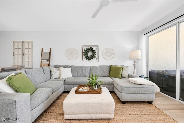 9087 Michael Cir Unit 9, Naples, FL 34113 - living area with light wood finished floors and ceiling fan