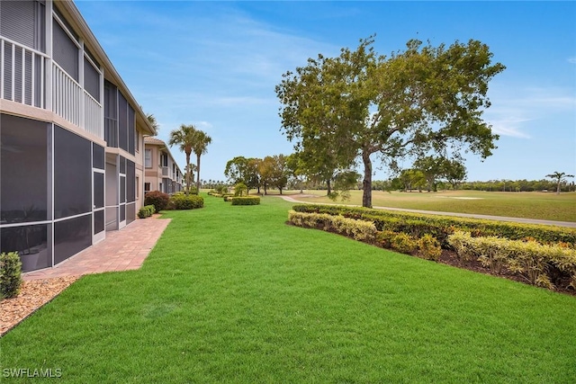 9087 Michael Cir Unit 9, Naples, FL 34113 - view of property's community with a yard