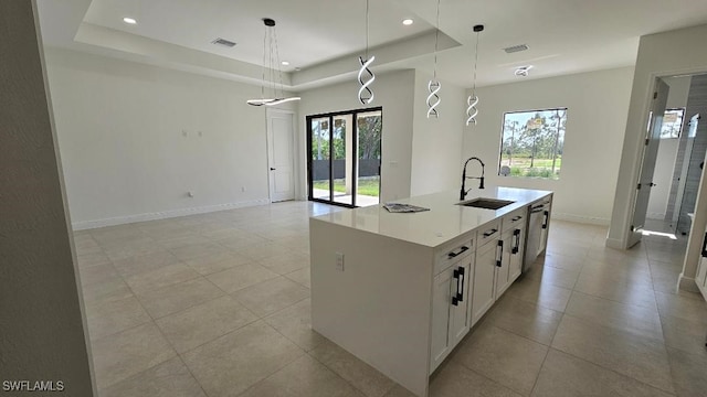 1019 Calvin Ave, Lehigh Acres, FL 33972 - kitchen with a sink, plenty of natural light, baseboards, light tile patterned flooring, and recessed lighting