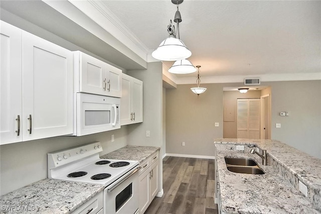 kitchen with white appliances, a sink, ornamental molding, decorative light fixtures, and white cabinetry