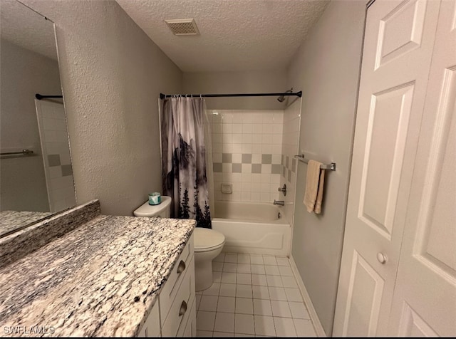 11510 Villa Grand Unit 404, Fort Myers, FL 33913 - full bath with a textured ceiling, vanity, tile patterned floors, shower / bath combination with curtain, and toilet