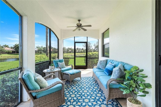 3159 Serena Ln Unit 102, Naples, FL 34114 - sunroom / solarium featuring ceiling fan, a water view, and an outdoor living space