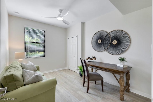 3159 Serena Ln Unit 102, Naples, FL 34114 - office featuring light wood-style floors, ceiling fan, and baseboards