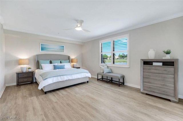 3159 Serena Ln Unit 102, Naples, FL 34114 - bedroom featuring crown molding, light wood-style flooring, baseboards, and ceiling fan