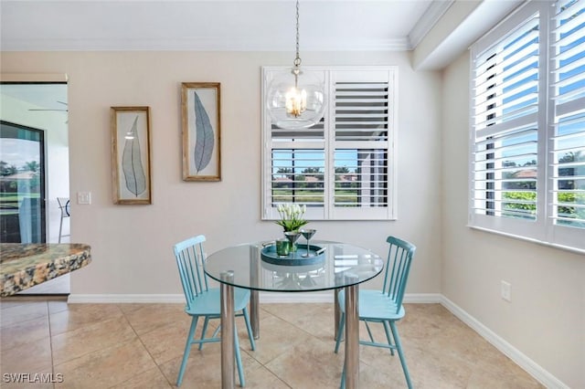 3159 Serena Ln Unit 102, Naples, FL 34114 - dining space with a chandelier, baseboards, ornamental molding, and light tile patterned floors