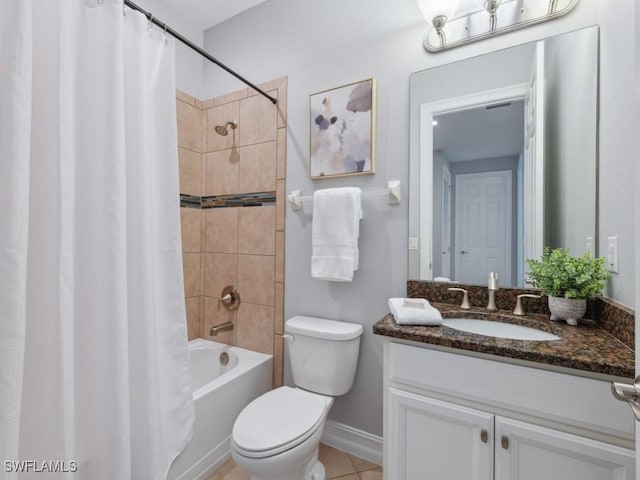 bathroom with toilet, shower / tub combo, vanity, tile patterned flooring, and baseboards