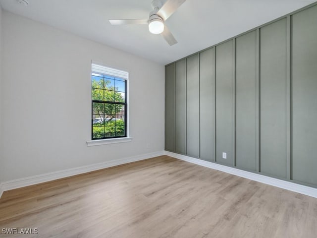 14326 Tuscany Pointe Trl, Naples, FL 34120 - spare room featuring light wood-style floors, ceiling fan, and baseboards
