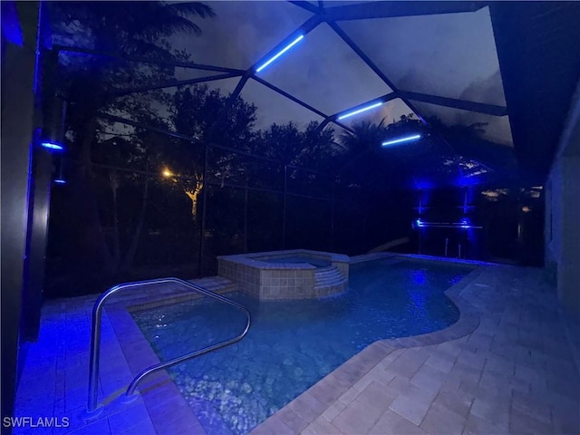 14326 Tuscany Pointe Trl, Naples, FL 34120 - pool at twilight with a pool with connected hot tub and a patio area