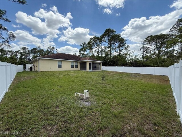 3206 35th St W, Lehigh Acres, FL 33971 - back of property with stucco siding
