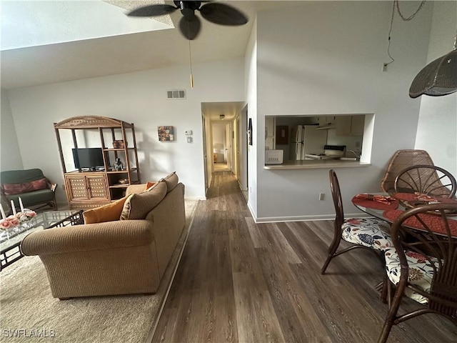 9970 Sailview Ct Unit 19, Fort Myers, FL 33905 - living room featuring high vaulted ceiling, wood finished floors, ceiling fan, and baseboards