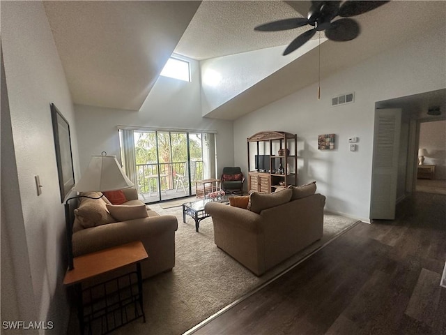 9970 Sailview Ct Unit 19, Fort Myers, FL 33905 - living area featuring wood finished floors, high vaulted ceiling, a ceiling fan, a textured ceiling, and baseboards