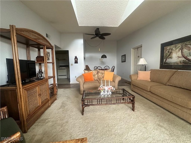 9970 Sailview Ct Unit 19, Fort Myers, FL 33905 - living room with a ceiling fan, carpet floors, and a textured ceiling