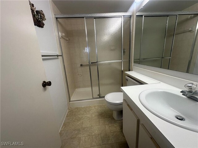 9970 Sailview Ct Unit 19, Fort Myers, FL 33905 - full bath with a stall shower, toilet, vanity, and baseboards