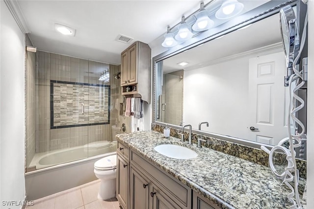 174 S Collier Blvd Unit 304, Marco Island, FL 34145 - bathroom with tile patterned floors, toilet, vanity, enclosed tub / shower combo, and crown molding