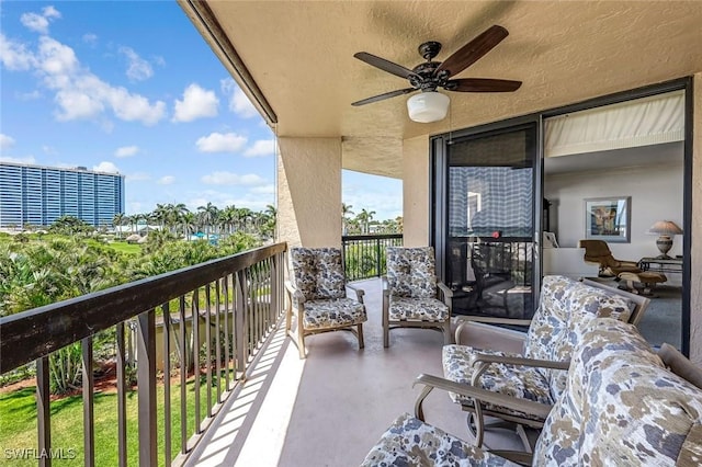 174 S Collier Blvd Unit 304, Marco Island, FL 34145 - balcony featuring ceiling fan