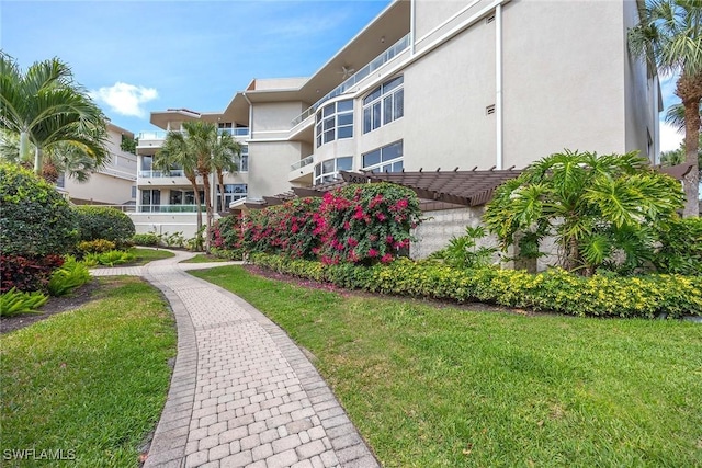 2630 Grey Oaks Dr N Unit B18, Naples, FL 34105 - view of community featuring a yard
