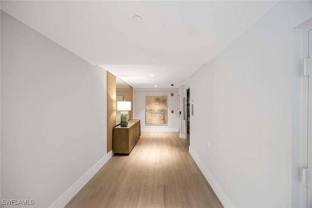 2630 Grey Oaks Dr N Unit B18, Naples, FL 34105 - corridor featuring light wood finished floors, baseboards, and recessed lighting