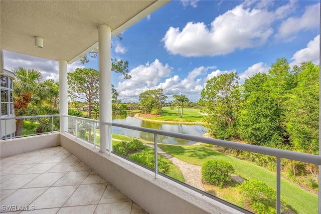 2630 Grey Oaks Dr N Unit B18, Naples, FL 34105 - balcony with a water view and view of scattered trees