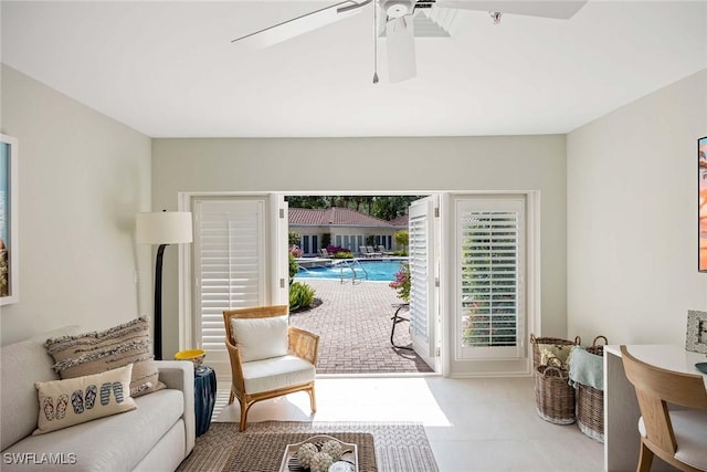 2630 Grey Oaks Dr N Unit B18, Naples, FL 34105 - living room with ceiling fan