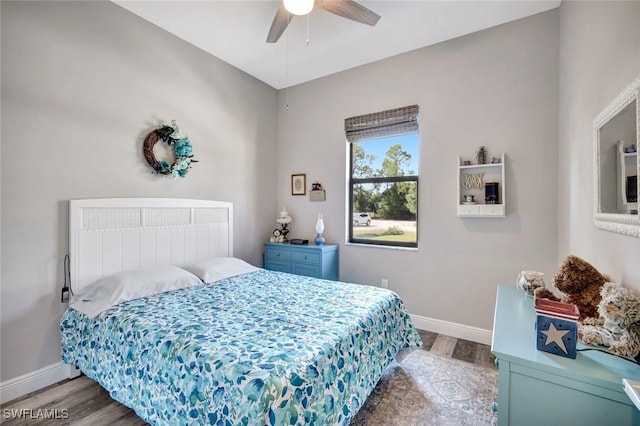 7824 7th Ter, Labelle, FL 33935 - bedroom featuring light wood finished floors, baseboards, and a ceiling fan
